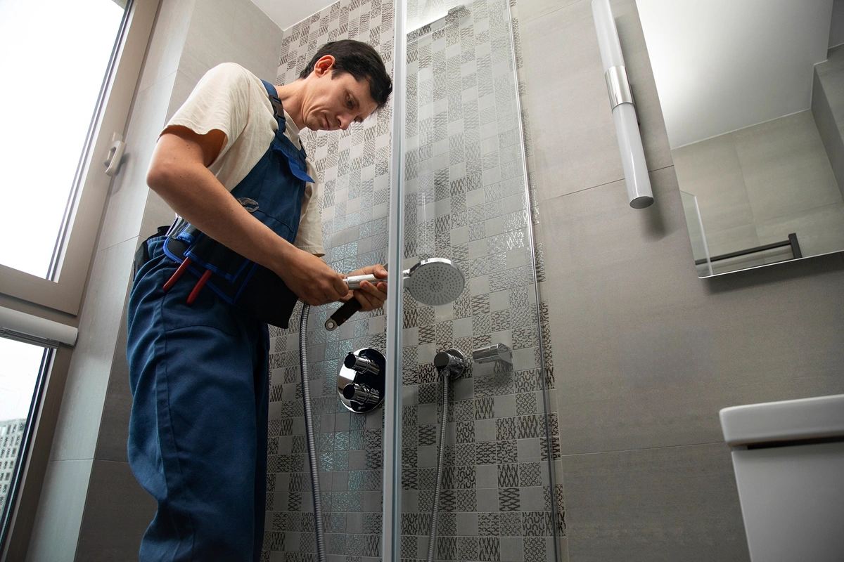 Bathroom remodel featuring new vanity and tile surround