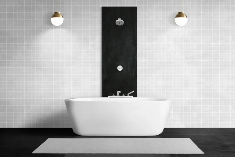 Dark-themed bathroom with modern fixtures and tile