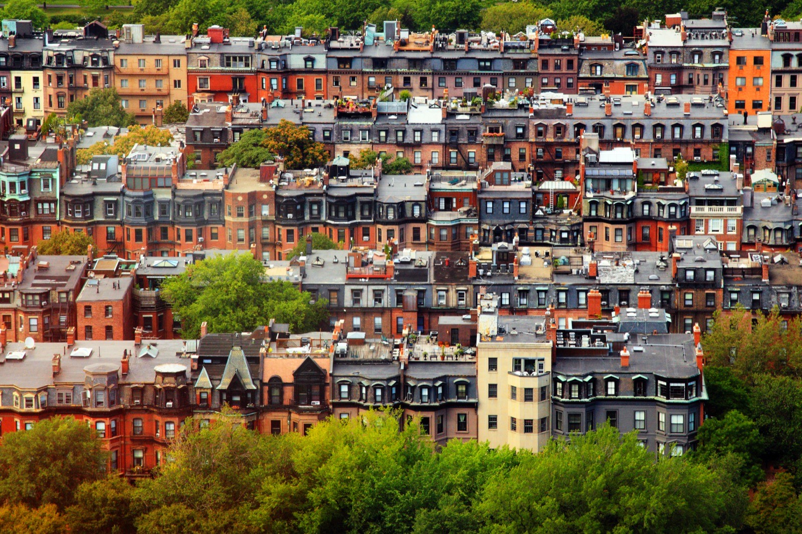 Back Bay brownstone rooftops packed together, the masonry housing stock most Boston bathroom remodeling happens in