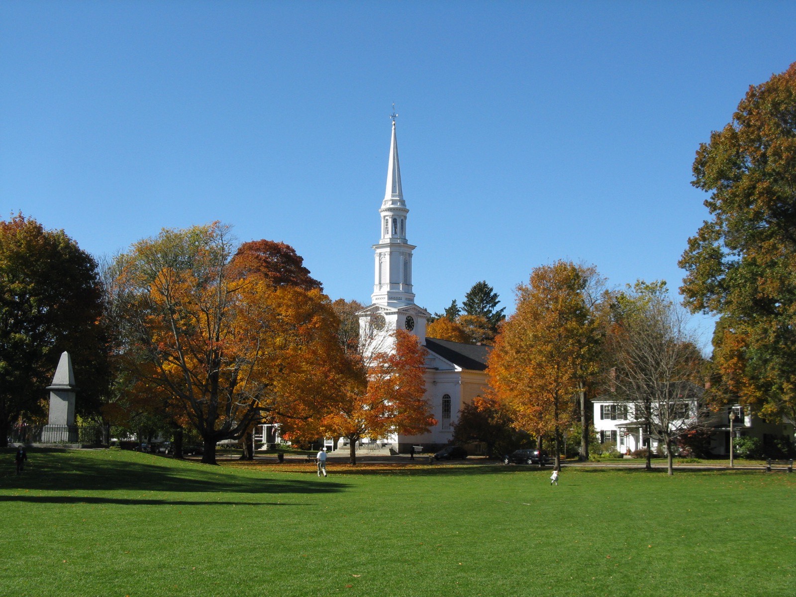 The Battle Green in Lexington in autumn, with the meetinghouse steeple beyond