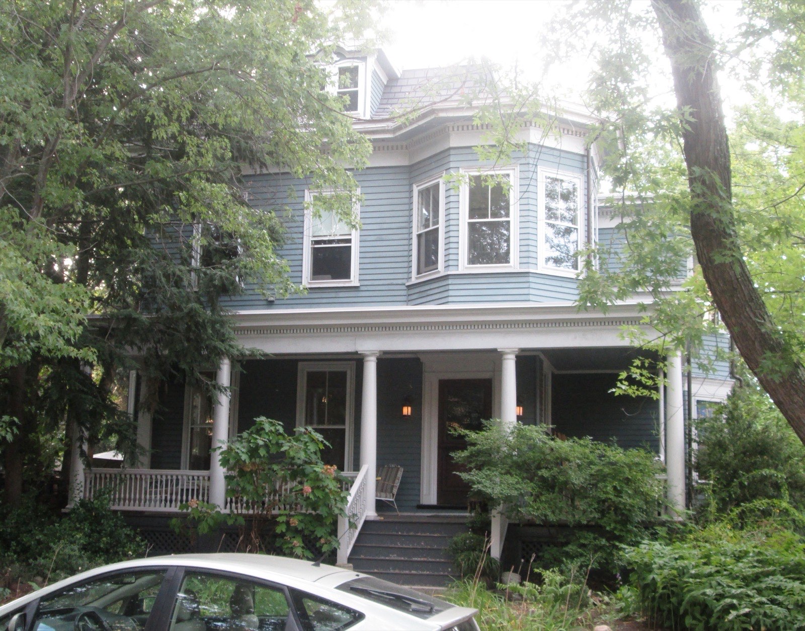 A Queen Anne single with a full-width porch on Chester Street, Somerville