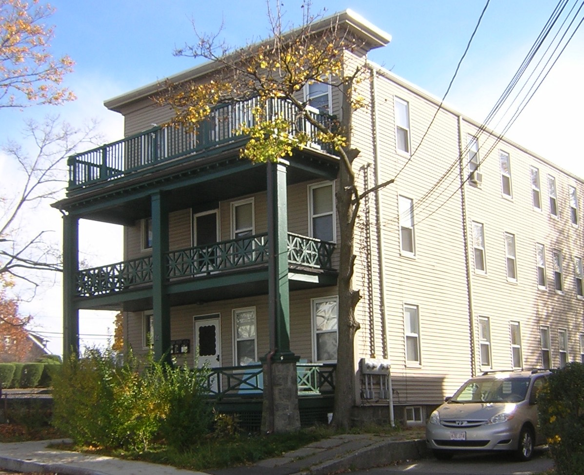 A three-decker with stacked front porches on Hunt Street in North Quincy