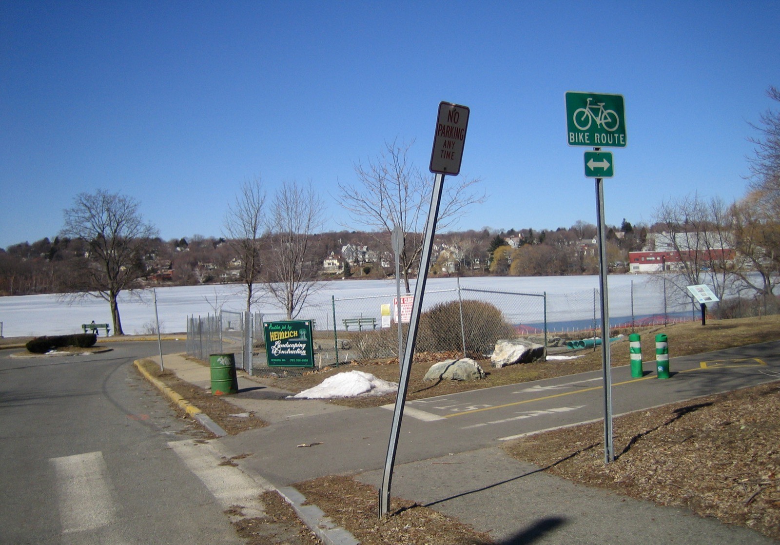 Spy Pond frozen over in Arlington, with the Minuteman Bikeway alongside